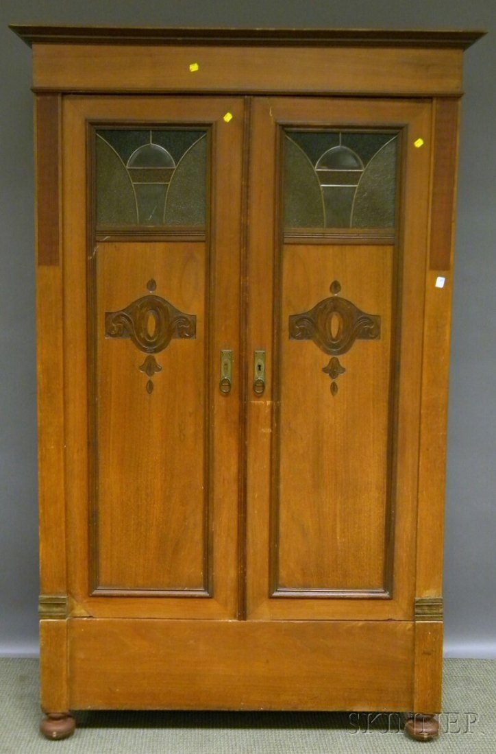 Edwardian Leaded Art Glass and Mahogany Veneer Two: Edwardian Leaded Art Glass and Mahogany Veneer Two-door Armoire, each front corner panel inset with ripple molded panels.