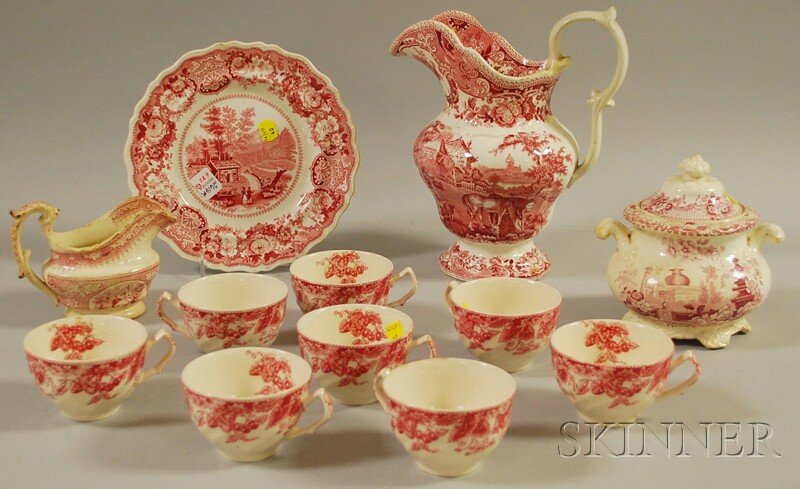 Twelve Pieces of English Red and White Transfer Pa: Twelve Pieces of English Red and White Transfer Pattern Staffordshire Tableware, including a "View Near Conway New Hampshire U.S." plate, a cream jug, covered sugar, pitcher, and set of eight cups.