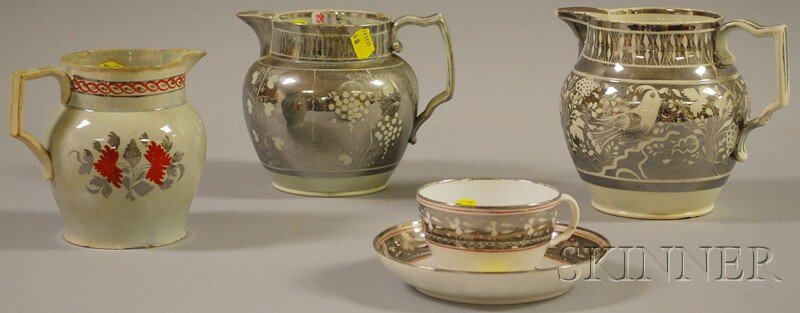 Five Pieces of English Silver Lustre Tableware, th: Five Pieces of English Silver Lustre Tableware, three jugs, and a cup and saucer.