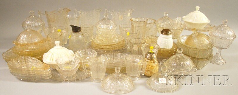 Approximately Seventy-five Pieces of Mostly Color: Approximately Seventy-five Pieces of Mostly Colorless Pressed Pattern Glass Tableware, including compotes, cake and pastry plates, goblets, plates, bowls, pitchers, a syrup, caster, celeries, ice crea