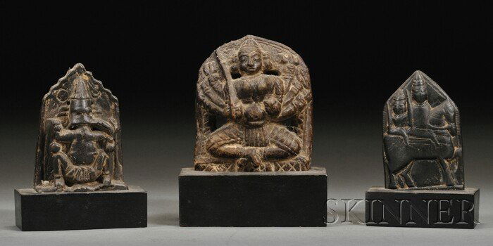 Three Carved Stone Stelae, India, 19th century, fig: Three Carved Stone Stelae, India, 19th century, figures of Narasimha, Surya, and Durga, ht. approx. 4 to 6 in.