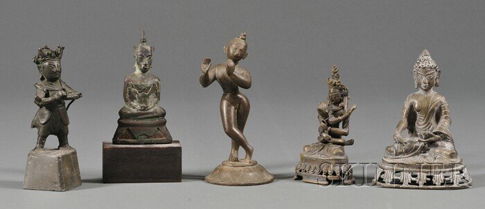 Five Bronze Divinities, two from Nepal, a Thai seat: Five Bronze Divinities, two from Nepal, a Thai seated Buddha, a figure of Krishna, and a standing figure of Guandi, ht. to 7 in.