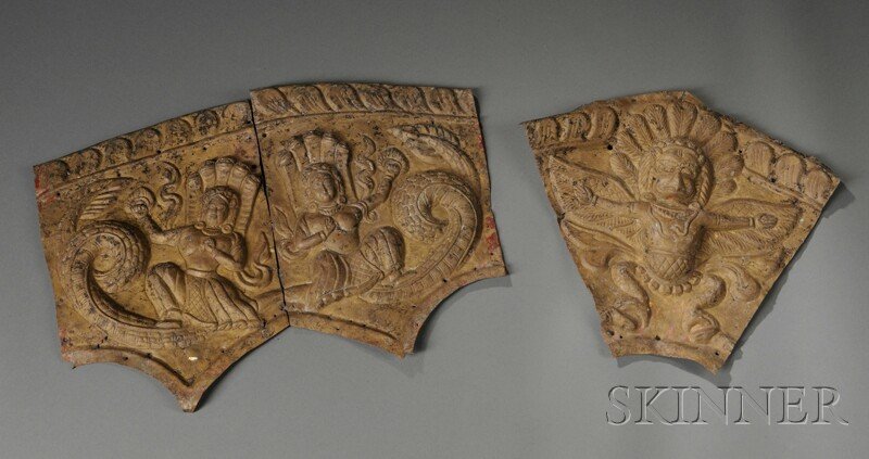 Repousse Metal Toran, Nepal, in three parts, depict: Repousse Metal Toran, Nepal, in three parts, depicting the Garuda in the middle, flanked by a Naga Kanya on either side, overall lg. 29 1/2 in.