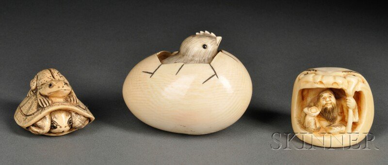 Three Carved Netsukes, Japan, a chick breaking out: Three Carved Netsukes, Japan, a chick breaking out of a shell, lg. 2 1/2; a figure, lg. 1 1/2; and a turtle surmounted by a frog, lg. 1 1/2 in.