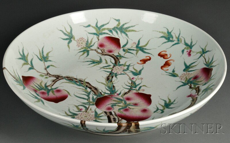 Porcelain Charger, China, the interior and exterio: Porcelain Charger, China, the interior and exterior decorated with a flowering and fruiting peach tree with red bats, dia. 19 in.