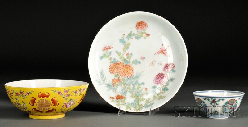 Three Porcelain Items, China, including a bowl dep: Three Porcelain Items, China, including a bowl depicting Babao pattern on yellow ground, with five bats at the interior well, dia. 6 1/2, a bowl decorated with blossoms, six-character Daoguang mark on