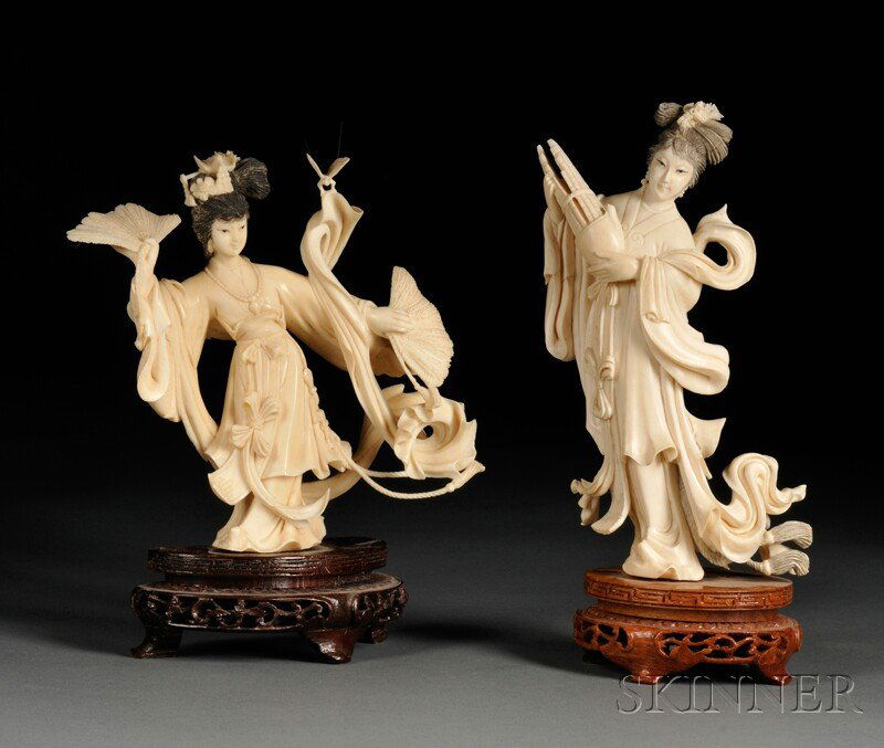 Two Ivory Ladies with Wood Stands, China, one carr: Two Ivory Ladies with Wood Stands, China, one carrying two fans, the other holding a musical instrument, ht. to 6 1/2 in.