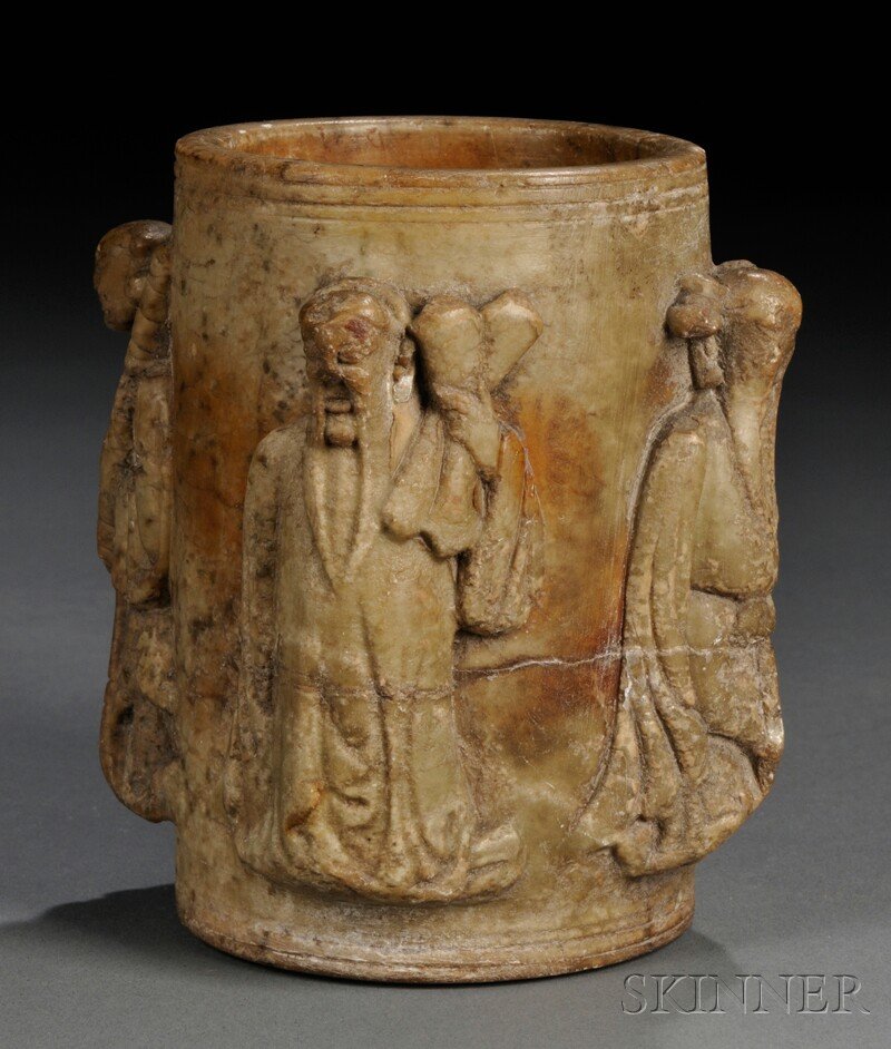 Soapstone Brush Pot, China, carving with four figu: Soapstone Brush Pot, China, carving with four figures in high relief at the exterior, brownish-gray stone with markings, ht. 4 1/2 in.