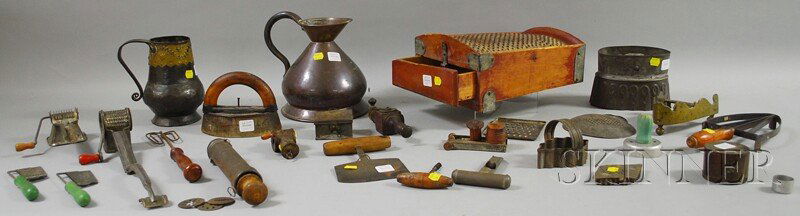 Group of Mostly Kitchen Items, including a copper: Group of Mostly Kitchen Items, including a copper haystack measure, a brass-mounted copper jug, two brass and iron flat iron trivets, nutmeg graters, a large red-painted wood and punched tin grater, n