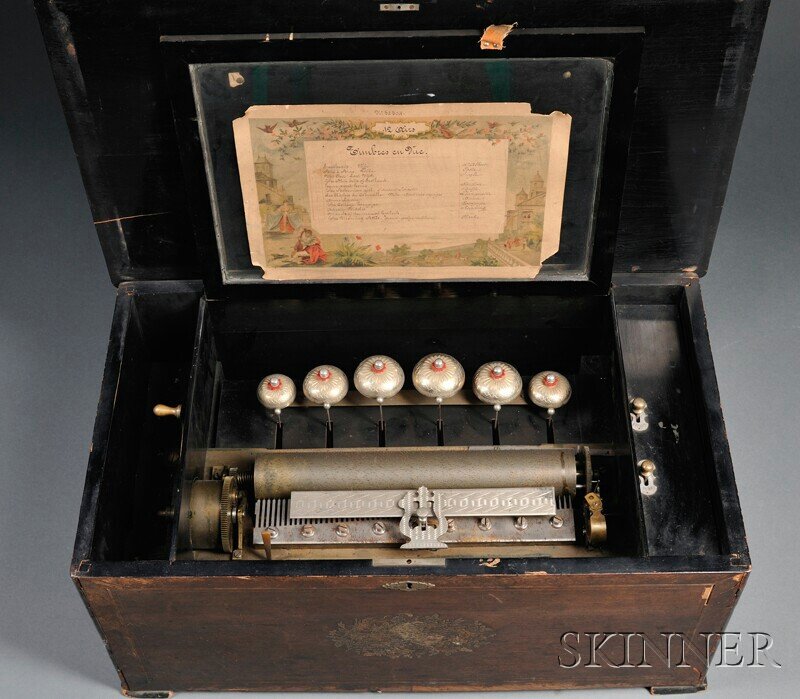 Timbres en Vue Twelve-air Six-bell Musical Box, no: Timbres en Vue Twelve-air Six-bell Musical Box, no. 32304, 13-in. cylinder, single comb, engine-turned bells, zither attachment, lever-wind, accompanied by original tune sheet, in a rosewood veneer an