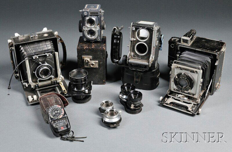 Collection of Medium and Large Format Cameras and: Collection of Medium and Large Format Cameras and Lenses, c. 1950, including a Linhof Munchen Technika III 4 x 5 with a Wollensak Raptar 135mm f/4.7 lens in a Rapak shutter; a 4 x 5 Graflex Speed Grap