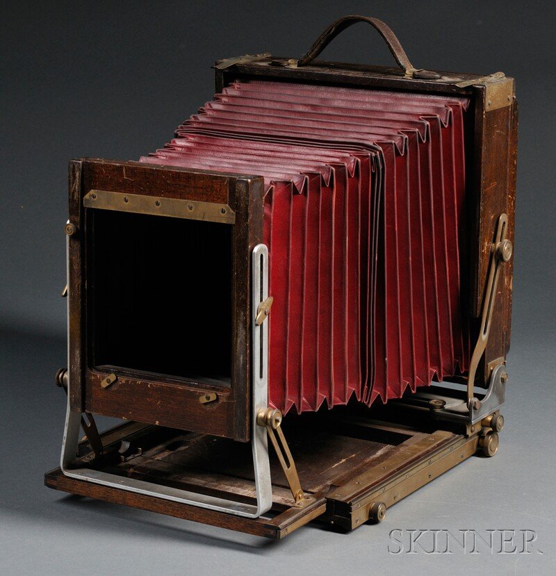 Deardorff 8 x 10 Field Camera, Chicago, Illinois,: Deardorff 8 x 10 Field Camera, Chicago, Illinois, mahogany body and base, red leather bellows, gold-tone brass hardware, reversible back, front tilt, rise and fall, rear tilt and swing, geared front a