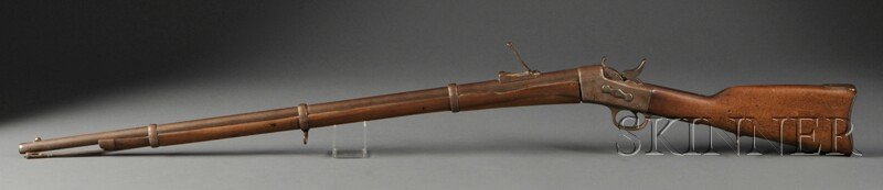 Remington Rolling Block Rifle, c. 1860, walnut sto: Remington Rolling Block Rifle, c. 1860, walnut stock with strap behind hammer marked in part Remington Pat. 1860, Middle Eastern markings behind barrel behind the site, lg. 50 in.