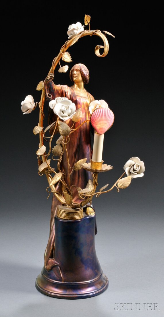 , Zsolnay Figural Lamp, Pottery and metal, Art Nou: Zsolnay Figural Lamp Pottery and metal Design by Sandor Apati Abt (1870-1916), Hungary, c. 1900 Art Nouveau figure of a woman in purple and copper eosin glaze, with gilt vine, and candlestick light, r