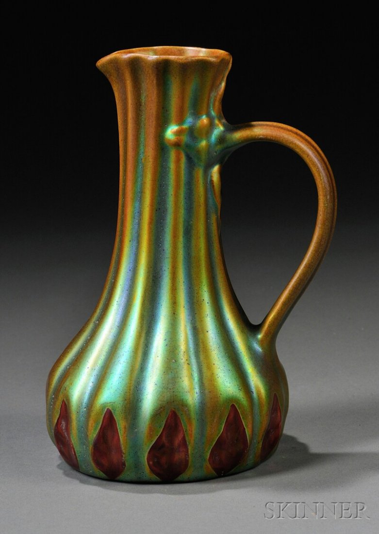 , Art Nouveau Zsolnay Pitcher, Art pottery, Eosin: Art Nouveau Zsolnay Pitcher Art pottery Hungary, c. 1900 Eosin green and red glaze on ribbed organic form, round factory mark and impressed 5585, base rim glaze nick, ht. 6 in.