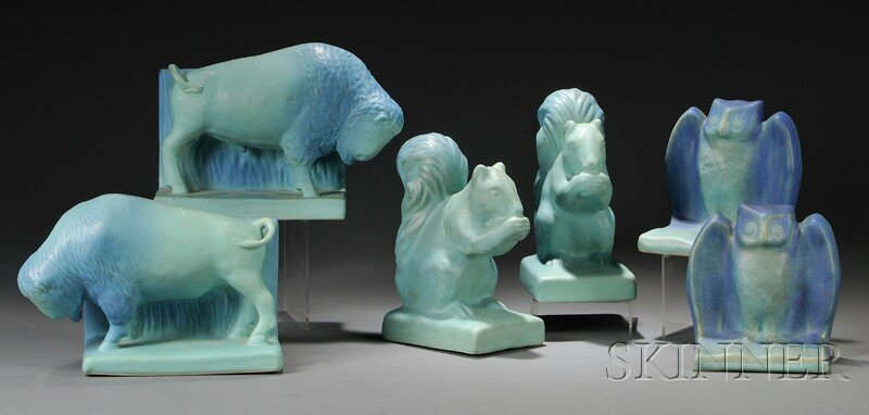 , Three Pairs of Bookends Attributed to Van Briggl: Three Pairs of Bookends Attributed to Van Briggle Art pottery Colorado Springs, Colorado, 20th century Owl bookends in turquoise blue glaze, squirrel and bison bookends, both in turquoise glaze, bison