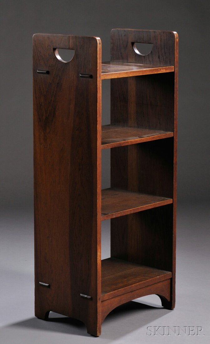 , Gustav Stickley D-handle Open Bookstand, Oak, Fo: Gustav Stickley D-handle Open Bookstand Oak New York, 1904-1912, model 79 Four shelves, the top and bottom with through-tenon joints, over beveled feet with arched aprons, bearing red Gustav Stickley 