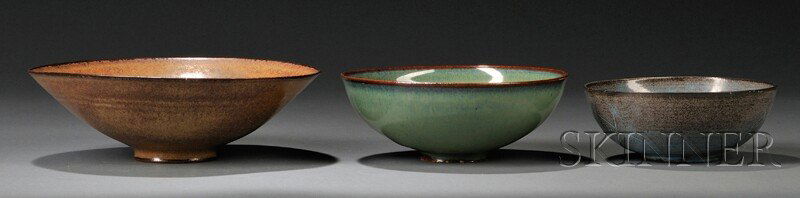 , Three Edwin and Mary Scheier Bowls, Art pottery,: Three Edwin and Mary Scheier Bowls Art pottery New Hampshire, mid-20th century The first with wide mouth and shallow recessed foot in a semi-matte mottled brown glaze with a dark brown rim and base, s