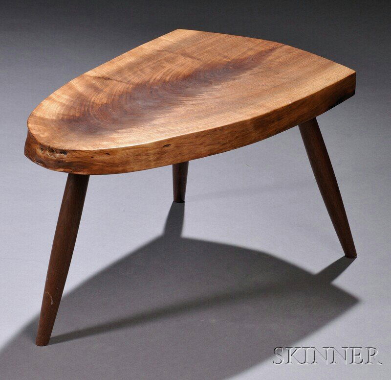 , Mira Nakashima Wohls Table, Walnut, Rounded end: Mira Nakashima Wohls Table Walnut New Hope, Pennsylvania, c. 1997 Rounded end with center grain on top over tapered wood legs, approx. top thickness 1 1/2, ht. 12 5/8, lg. 21 5/8, dp. 13 3/4 in.