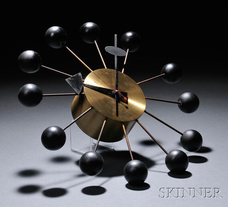 , George Nelson Ball Clock, Wood and metal, Twelve: George Nelson Ball Clock Wood and metal Model 4755, Howard Miller Clock Company, design 1947 Twelve black-painted wooden balls on brass-finished rods and brushed brass case, with manufacturer's label,