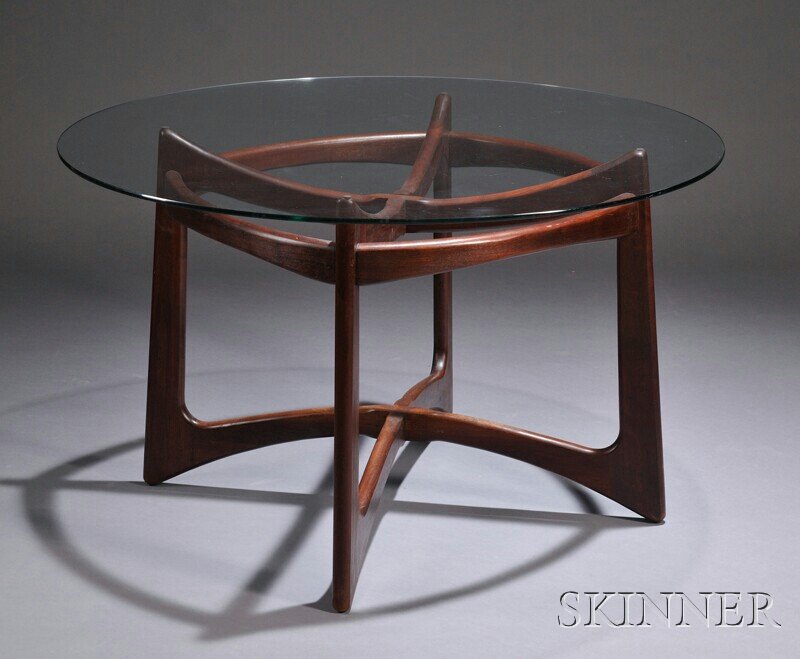 , Adrian Pearsall (1925-2011) Craft Associates Din: Adrian Pearsall (1925-2011) Craft Associates Dining Table Wilkes-Barre, Pennsylvania, mid-20th century Circular glass top resting on a sculpted walnut frame, model number 2458-T48, ht. 28 1/2, dia. 48