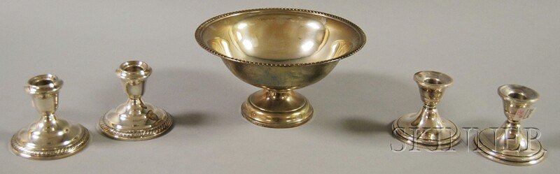 Five Pieces of Weighted Sterling Silver Tableware,: Five Pieces of Weighted Sterling Silver Tableware, a footed bowl and two pairs of candleholders, bowl ht. 4 1/2, dia. 9, candleholders ht. to 3 1/4 in., approx. 56.9 troy oz. total.