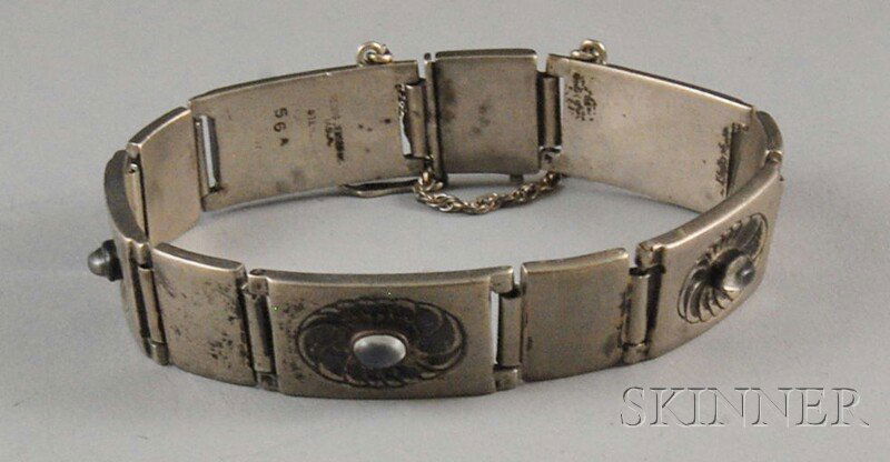 Georg Jensen U.S.A. Sterling Silver and Moonstone: Georg Jensen U.S.A. Sterling Silver and Moonstone Bracelet, composed of five rectangular plaques each centering an engraved whorl design set with a moonstone, alternated with plain square sterling pla