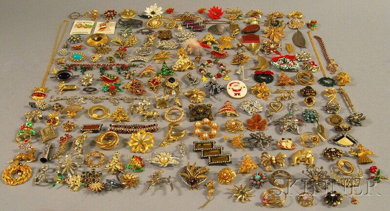 Large Group of Costume Jewelry, including a large: Large Group of Costume Jewelry, including a large amount of Christmas jewelry and an assortment of brooches, some vintage pieces, paste and rhinestone, enamel, and other items, some signed, makers inc