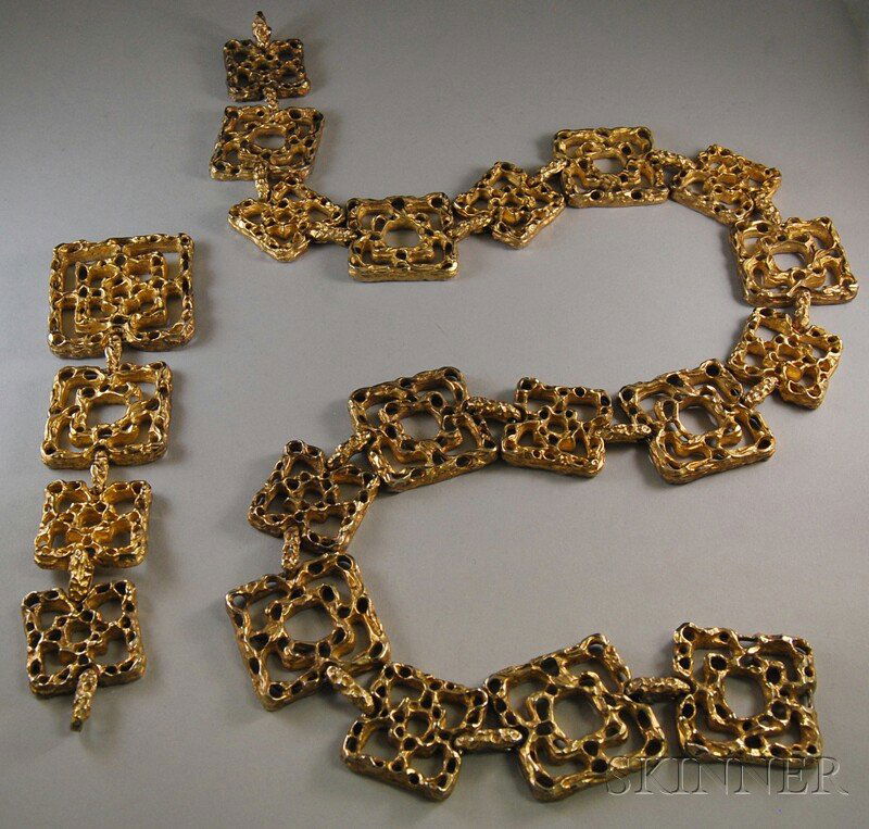 Cartier Vermeil Belt, the adjustable belt composed: Cartier Vermeil Belt, the adjustable belt composed of varying size abstract pierced concentric square links, impressed Cartier mark to large link at one end, lg. overall 36 1/2 in.