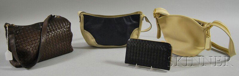 Four Designer Leather Purses, including a brown wo: Four Designer Leather Purses, including a brown woven Bottega Veneta, a saddle-style navy and cream Salvatore Ferragamo cross-body bag, an ivory Coach bag, and a black woven Bottega Veneta wallet with