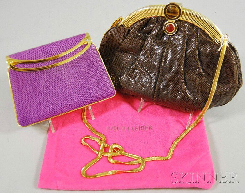 Two Judith Leiber Snakeskin Purses, one brown with: Two Judith Leiber Snakeskin Purses, one brown with hardstone decorative elements and a purple hard-case evening-style, lg. to 9 in.
