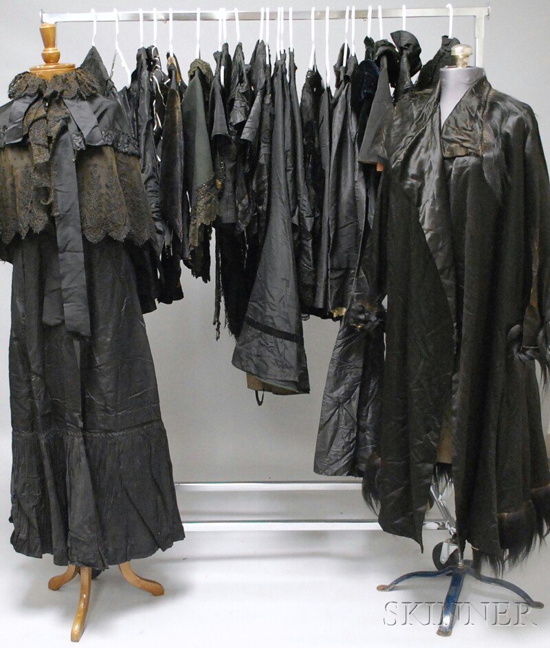 Group of Mostly Black Victorian Mourning Clothing,: Group of Mostly Black Victorian Mourning Clothing, including long skirts, bodices, a shawl, a man's vest, a number of capes and other jackets.