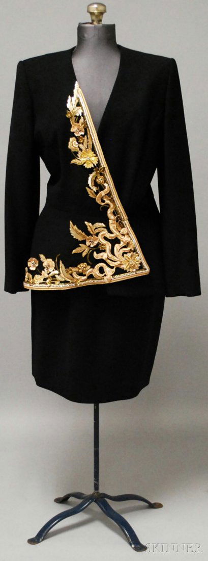 Oscar de La Renta Black Skirt Suit with Asymmetric: Oscar de La Renta Black Skirt Suit with Asymmetrical Gold Floral Decoration, gold sequin, bead, and embroidered floral design with rhinestone accents at right side of jacket collar and crossing over a