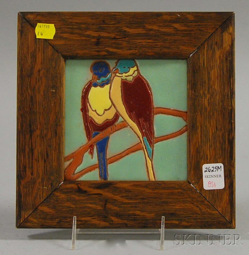 Smith & Johson Art Pottery Parrot Tile, in an oak: Smith & Johson Art Pottery Parrot Tile, in an oak frame, the tile reverse with incised mark and "R A-C C" in a diamond, tile 5 1/2 x 5 1/2 in. Provenance: Penny Marshall Collection.