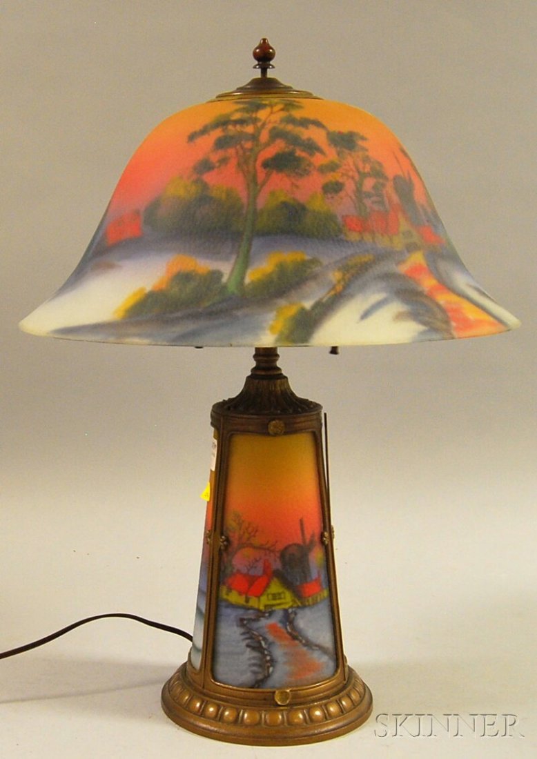 Pittsburgh-type Reverse-painted Windmill-landscape: Pittsburgh-type Reverse-painted Windmill-landscape-decorated Glass and Painted Cast Metal Table Lamp, glass with textured surface, illuminated base, two sockets, approx. ht. 21 3/4, dia. 16 1/2 in.