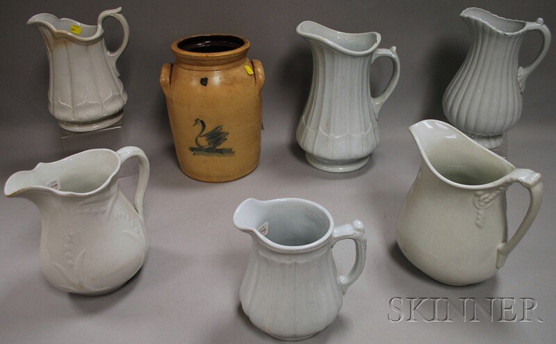 Six Assorted Ironstone Pitchers and Cobalt Swan-de: Six Assorted Ironstone Pitchers and Cobalt Swan-decorated Stoneware Crock, (varying crazing, staining, glaze wear, one pitcher with foot chips, one pitcher with rim chip, crock good condition, no cove