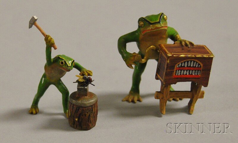 Austrian Miniature Cold-painted Bronze Figure of: Austrian Miniature Cold-painted Bronze Figure of a Frog with a Street Organ and a Figure of a Frog Using a Hammer to Hit a Fly on an Anvil, early 20th century, original paint, ht. to 1 5/8 in.