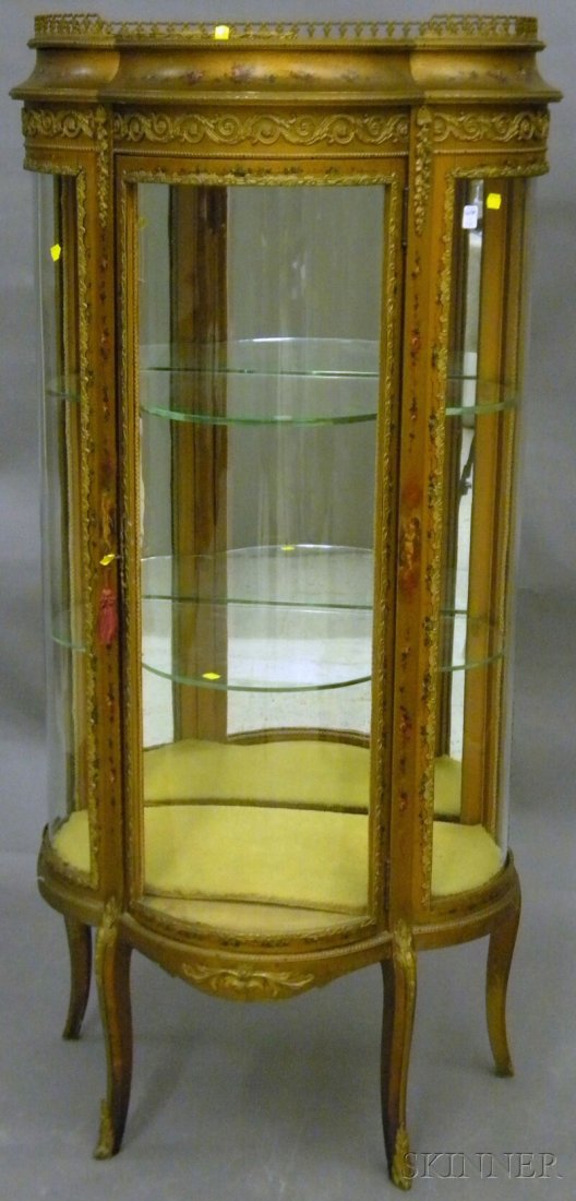 Louis XVI Vernis Martin-style Metal-mounted Hand-: Louis XVI Vernis Martin-style Metal-mounted Hand-painted Floral and Cherub-decorated Gold-finished Wood and Bowed-glass Vitrine, the interior with mirrored back and two fixed glass shelves, approx. ov