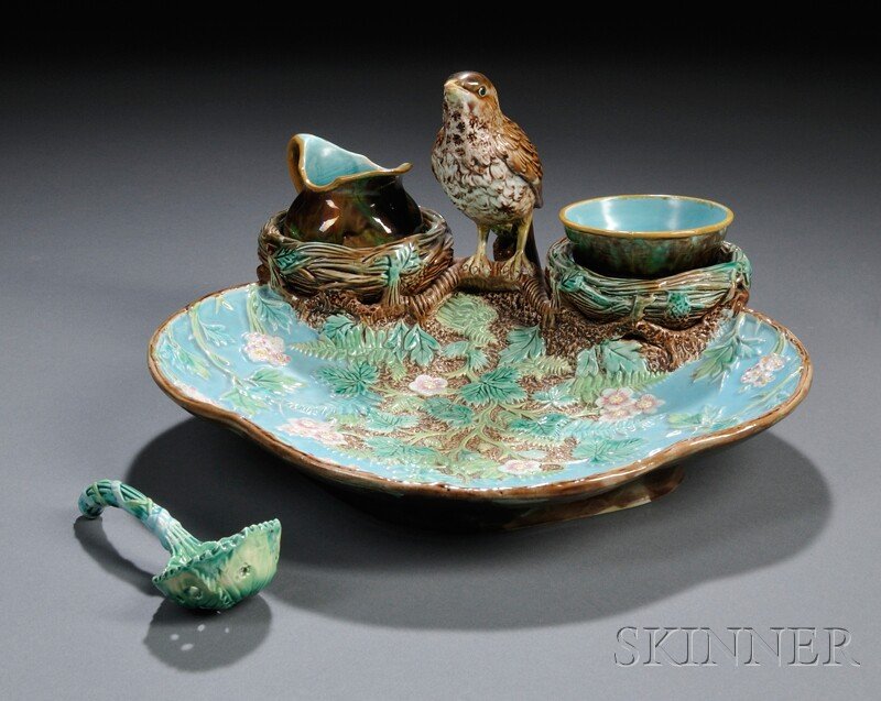 George Jones Majolica Strawberry Server, England,: George Jones Majolica Strawberry Server, England, c. 1870, polychrome enamel decorated and molded with blossoms and foliage to a shaped dish set with two "nest" wells centered by a perched bird, lg. 1