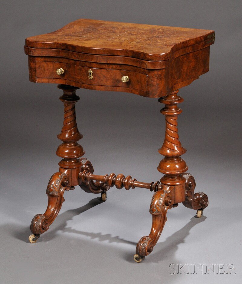 Victorian Burl Walnut Veneer Games Table, fold-ope: Victorian Burl Walnut Veneer Games Table, fold-open, swivel top opens to reveal an inlaid chessboard and backgammon board, above a frieze drawer with internal compartments for game pieces, raised on t