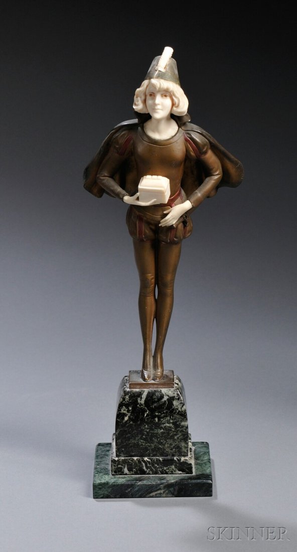 After Professor Otto Poertzel (German, 1876-1963): After Professor Otto Poertzel (German, 1876-1963) Cold-painted Bronze of a Page Boy with a Casket, cast with cape flowing behind him, an ivory feather in his cap, and an ivory casket clutched in both 
