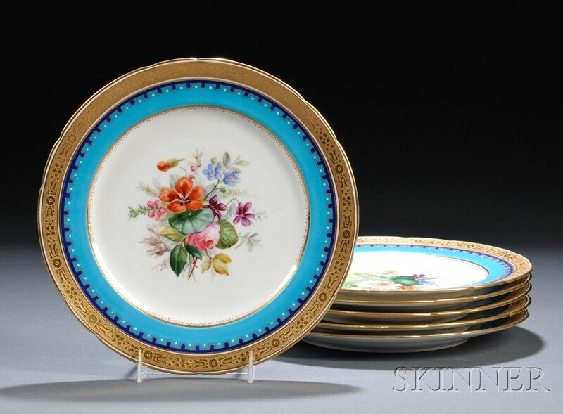 Six Minton Polychrome Enameled and Gilded Porcelai: Six Minton Polychrome Enameled and Gilded Porcelain Plates, England, pattern "G1212," most with date cipher for 1874, each with a different central hand-painted bouquet of flowers, navy and Minton blu