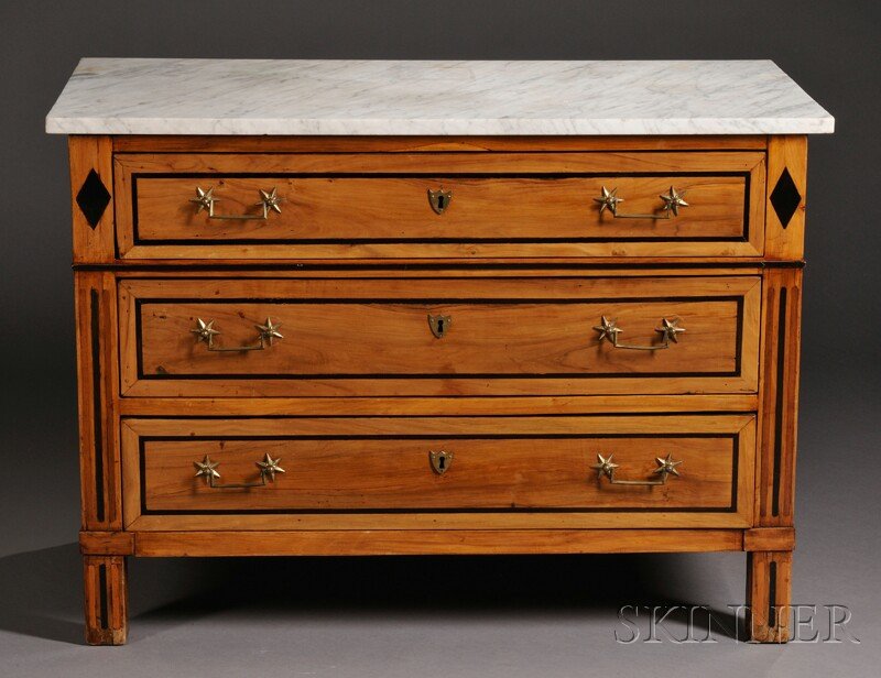 Continental Marble-top Fruitwood Veneered Commode,: Continental Marble-top Fruitwood Veneered Commode, late 19th century/early 20th century, the rectangular top over case fitted with three long drawers with brass pulls and shield-form key escutcheons, 