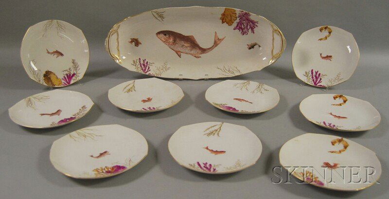 French B.D. Limoges Transfer-decorated Ten-piece P: French B.D. Limoges Transfer-decorated Ten-piece Porcelain Fish Service, c. 1900, comprised of nine shaped plates and a large oval serving tray, each decorated with a central image of a fish surrounde