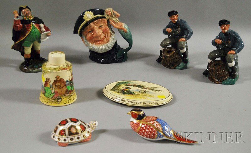 Eight Royal Doulton and Royal Crown Derby Ceramic: Eight Royal Doulton and Royal Crown Derby Ceramic Collectible Items, including Royal Doulton series ware Under the Greenwood Tree tea canister and trivet, figures Town Crier HN 2719, two The Lobsterma