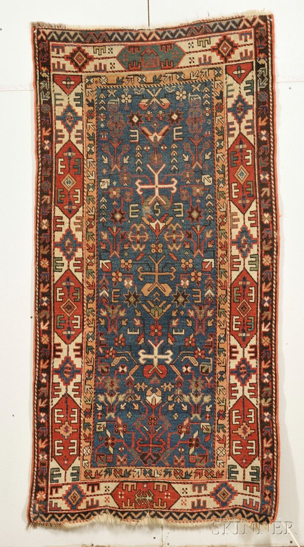East Caucasian Rug, last quarter 19th century, (ev: East Caucasian Rug, last quarter 19th century, (even wear to center, very small repair, some end fraying), 6 ft. 6 in. x 3 ft. 3 in.
