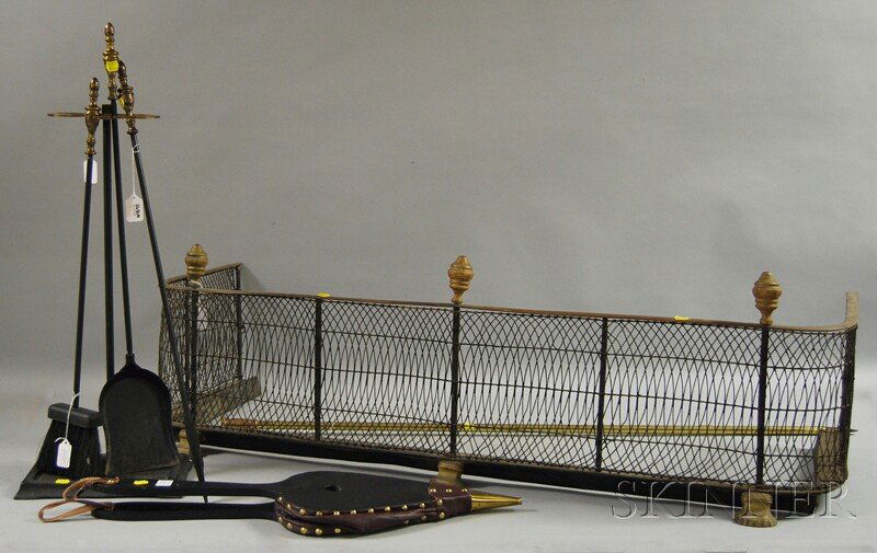 Seven Assorted Fireplace and Hearth Accessories, a: Seven Assorted Fireplace and Hearth Accessories, a brass and wire fireplace fender, a tool stand with three tools, a brass poker, a bellows, fender ht. 15, lg. 48 in.
