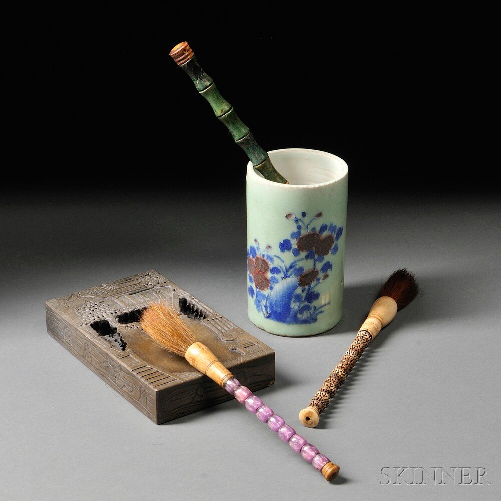 Five Scholar's Items, China, 20th century, a cyli: Five Scholar's Items, China, 20th century, a cylindrical celadon-glazed brush pot with underglazed blue and iron red floral decorations, ht. 6 1/8; a rectangular inkstone carved with figures at leisur