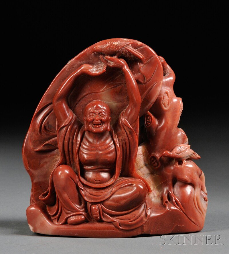 Soapstone Carving, China, 19th/20th century, depic: Soapstone Carving, China, 19th/20th century, depicting a luohan supporting a bird in his upraised hands, ht. 5 in.