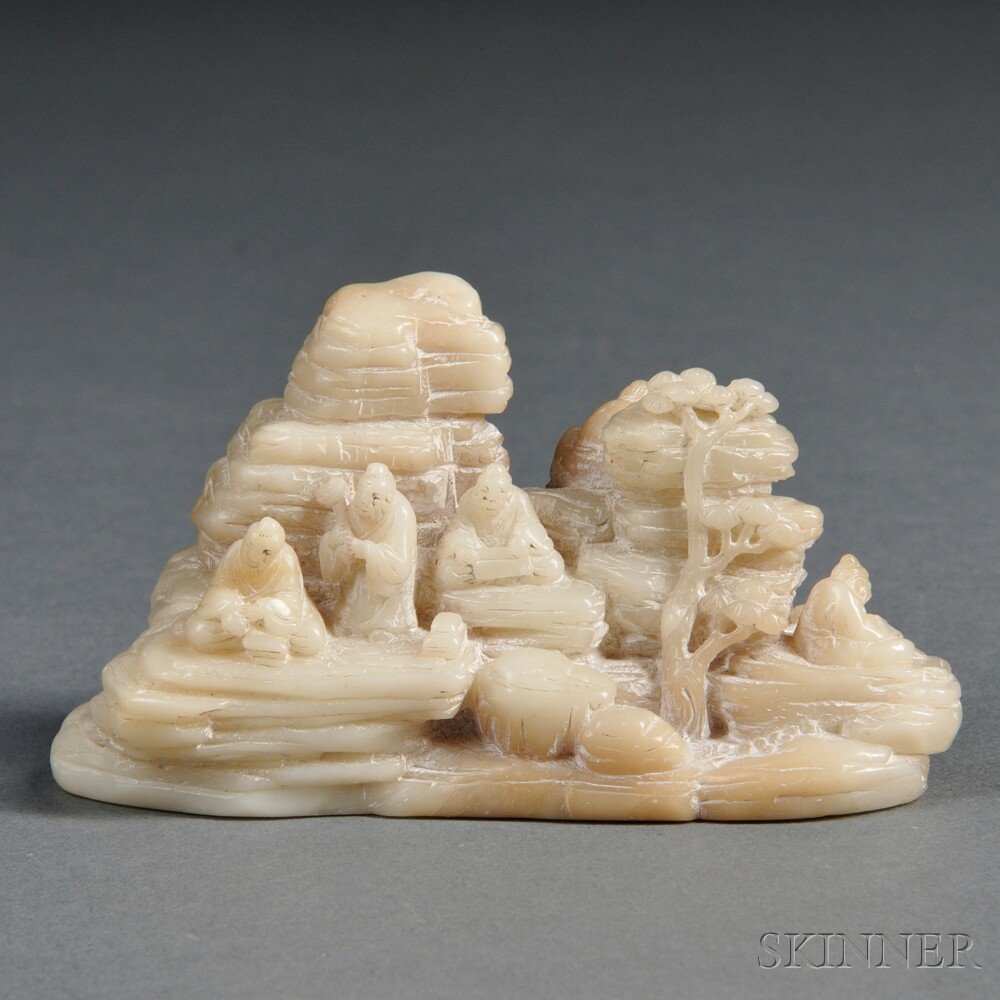 Soapstone Carving, China, 20th century, depicting: Soapstone Carving, China, 20th century, depicting Immortals seated in a grotto, lg. 4 1/4 in.